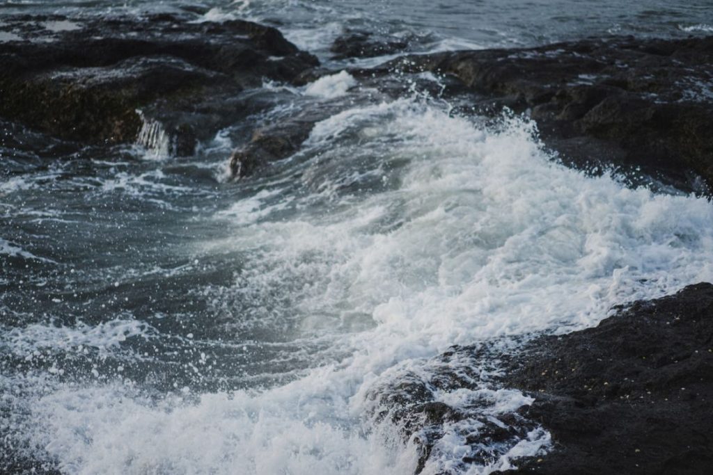 The tides swelling and rising up.